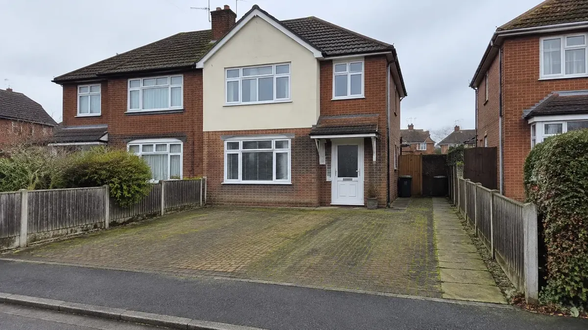 Before: algae-stained block-paved driveway at a red-brick Essex semi-detached family home